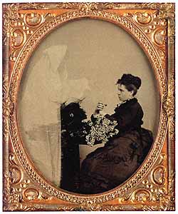 Unidentified Photographer (U.S.) Woman with Daisies and Spirit , Tintype, Sixth-plate,  circa 1875.