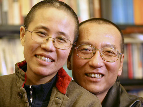 Chinese dissident Liu Xiaobo and his wife Liu Xia pose in this undated photo released by his family on October 3, 2010. Imprisoned Chinese pro-democracy activist Liu Xiaobo won the Nobel Peace Prize on October 8, 2010, an announcement that Beijing had anticipated and bitterly criticised.