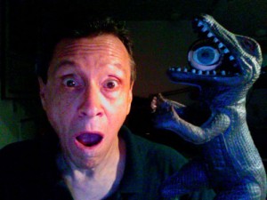 A. D. Coleman with dinosaur, self-portrait, 8-18-2011.