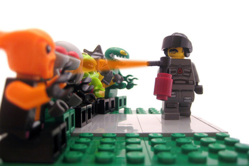 Pepper-spray cop with legos. Anonymous still life.