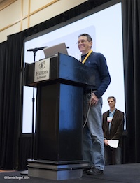 ADC at podium, SPE, Baltimore, March 7, 2014. Photo © by Harris Fogel.