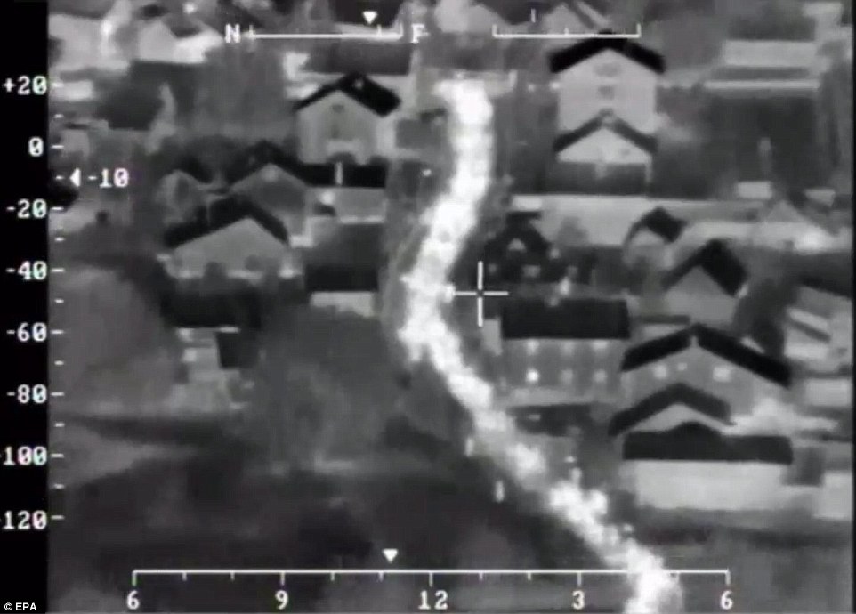 Slovenian police helicopter, thermal image of migrants crossing border to Croatia, October 2015
