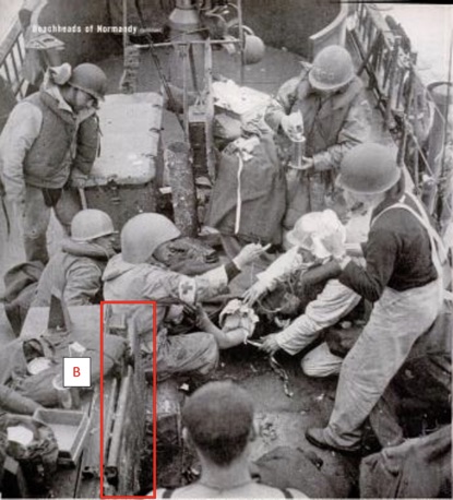 Figure 3. This photo was taken looking in the opposite direction (aft) from figure 1 and shows the location of the damaged shelf (‘B’) relative to where the crew struggled to save the life of Seaman 1st Class Jack DeNunzio. The number 2 gun mount is barely visible at the top of the photo. This photo was taken by Capa and was published in the June 19, 1944 edition of Life. Capa was standing on the open bridge at the top of ladder seen in Figure 1 (‘C’, out of fame to the bottom in this figure).