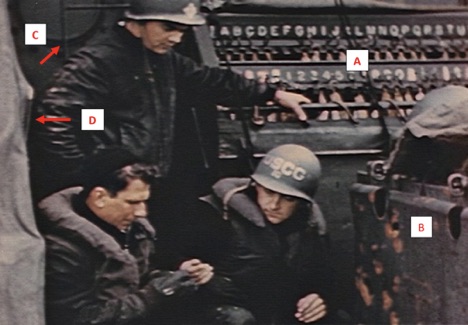 Figure 1. Three crewmen from LCI(L)-94 examine shell fragments plucked from equipment damaged by German fire on D-Day. Still from David T. Ruley film clip. (CriticalPast)