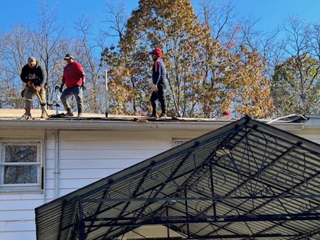 Our roofers at work, November 2023.